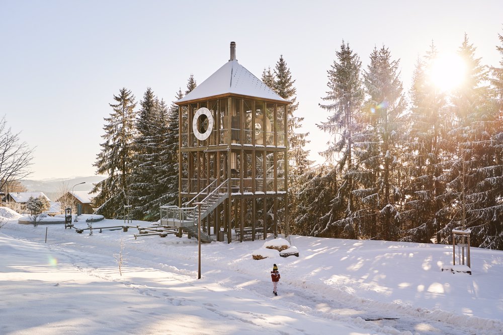 Exterior view in winter - Reka Holiday Village Montfaucon reka-holiday-village, western-switzerland, montfaucon Exterior view in winter - Reka Holiday Village Montfaucon reka-holiday-village, western-switzerland, montfaucon