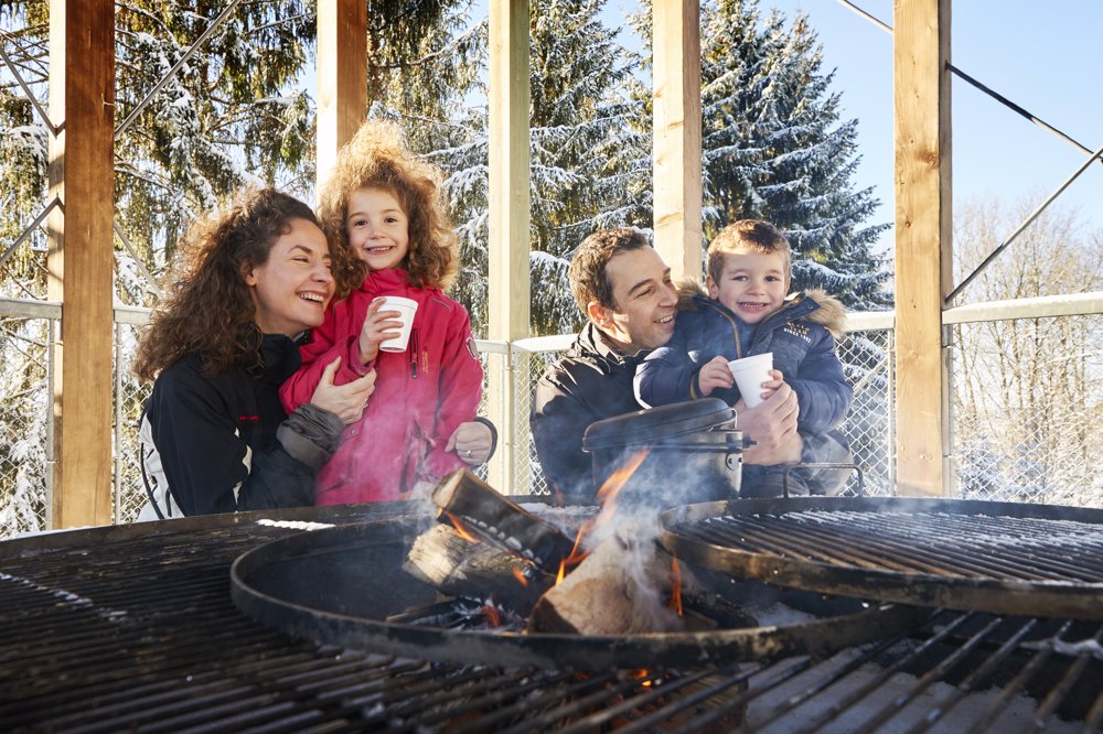 Exterior view in winter - Reka Holiday Village Montfaucon reka-holiday-village, montfaucon, western-switzerland Exterior view in winter - Reka Holiday Village Montfaucon reka-holiday-village, montfaucon, western-switzerland