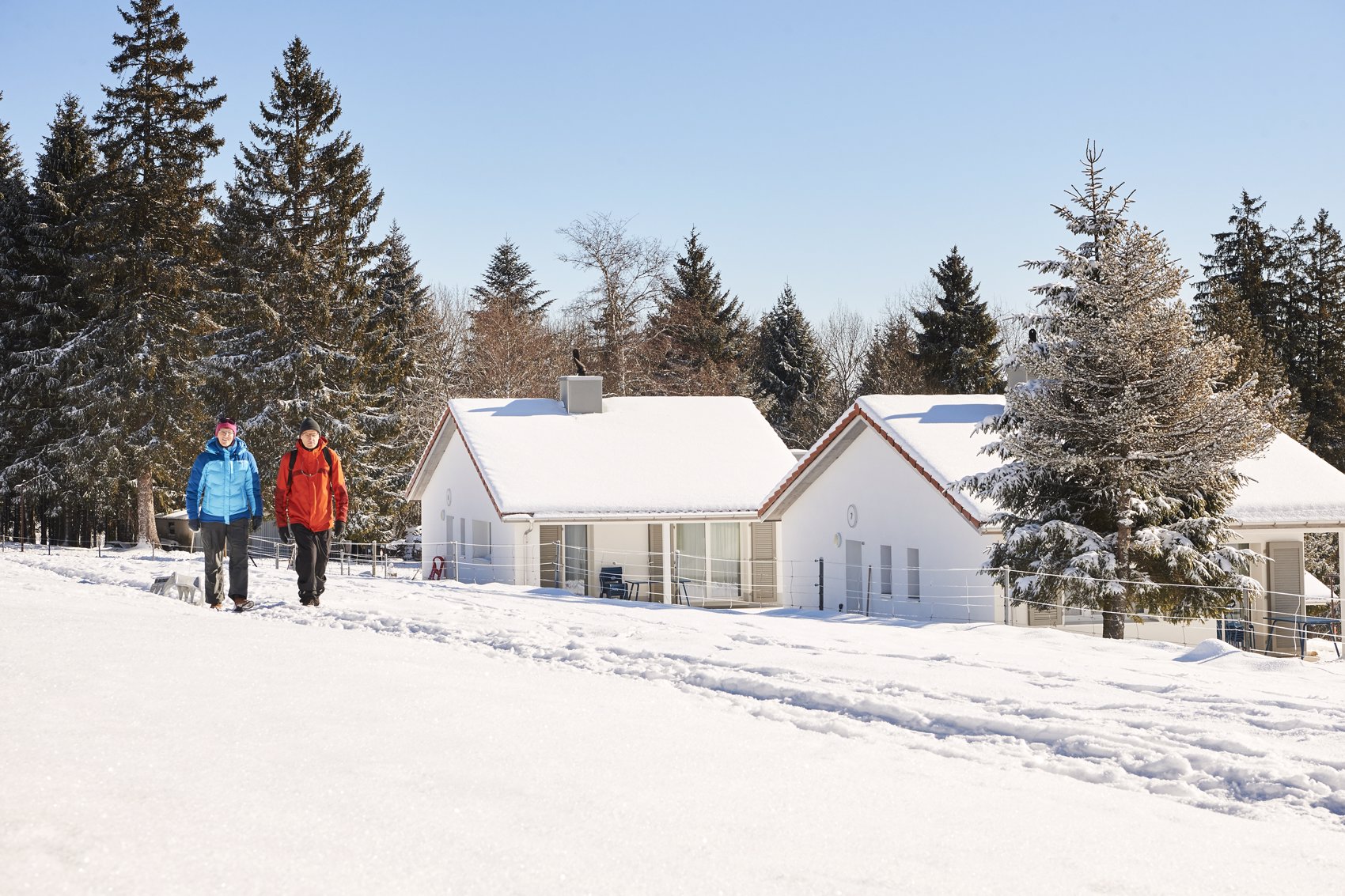 Exterior view in winter - Reka Holiday Village Montfaucon reka-holiday-village, western-switzerland, montfaucon Exterior view in winter - Reka Holiday Village Montfaucon reka-holiday-village, western-switzerland, montfaucon