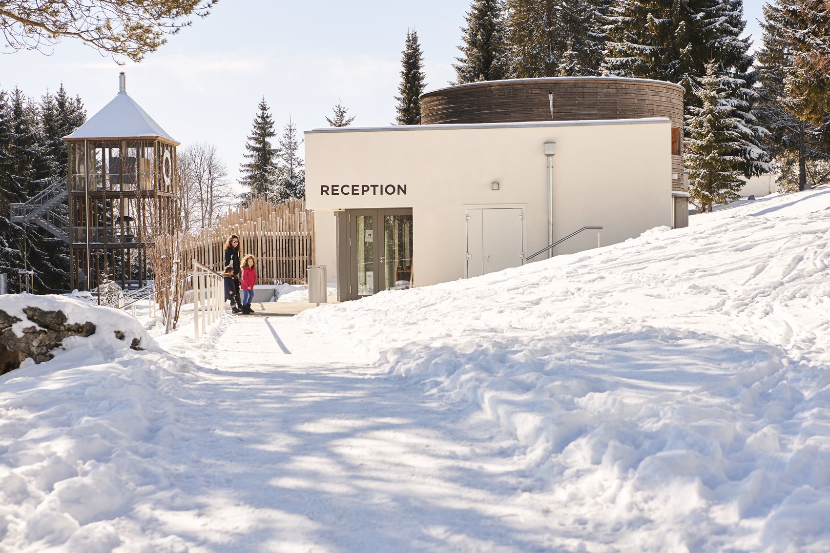 Exterior view in winter - Reka Holiday Village Montfaucon reka-holiday-village, western-switzerland, montfaucon Exterior view in winter - Reka Holiday Village Montfaucon reka-holiday-village, western-switzerland, montfaucon