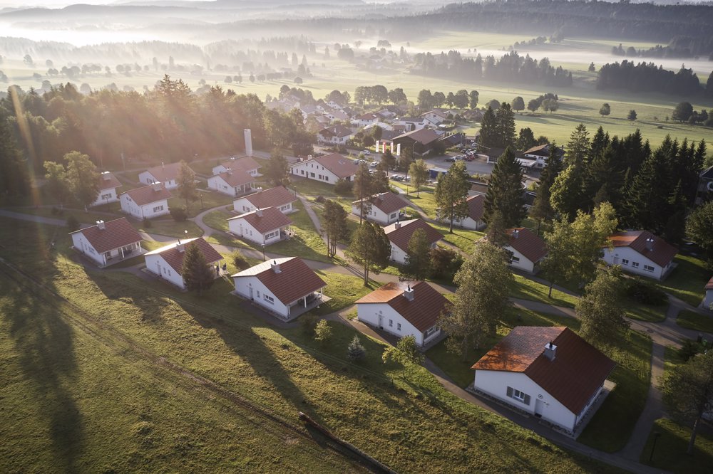 Exterior view in summer - Reka Holiday Village Montfaucon western-switzerland, reka-holiday-village, montfaucon Exterior view in summer - Reka Holiday Village Montfaucon western-switzerland, reka-holiday-village, montfaucon